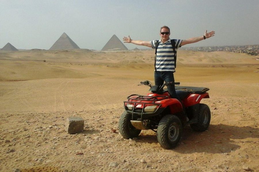 Astonshing photo with ATV quad bike ride beside the pyramids and the sphinx